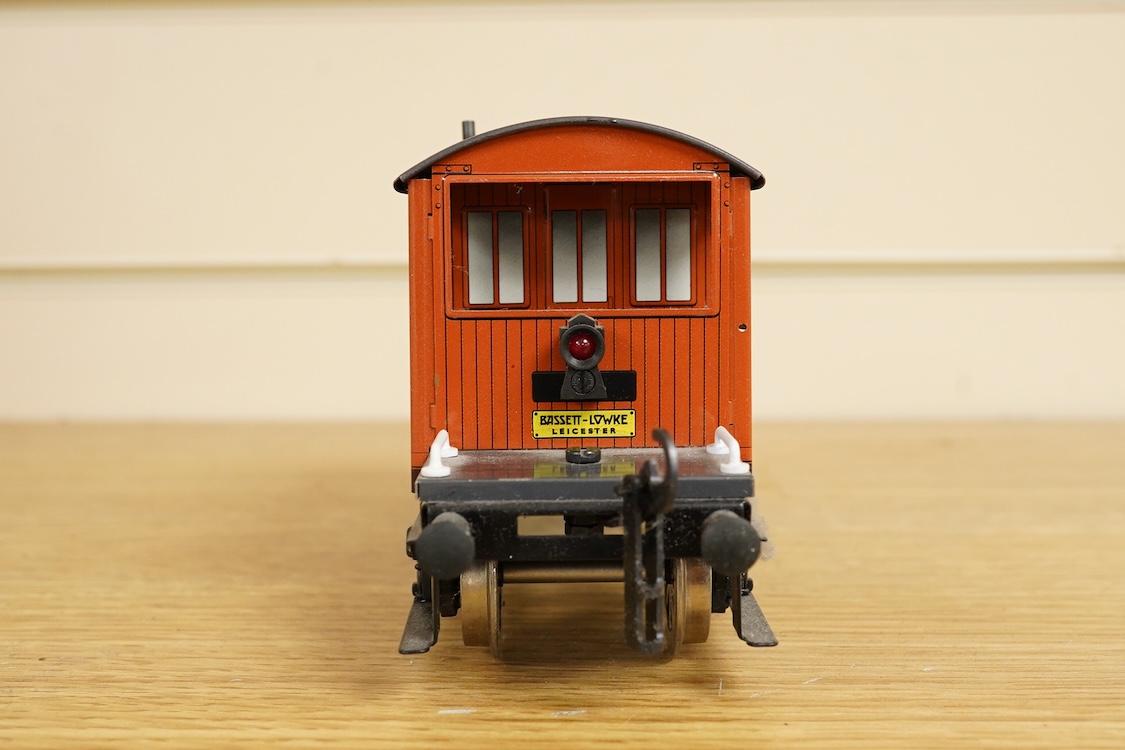 Four boxed Bassett-Lowke by Corgi 0 gauge railway freight wagons; a BR 20-ton brake van, together with two Southern Railways open wagons and a ventilated box van, together with a boxed Tenmille Products kit for a Talylly
